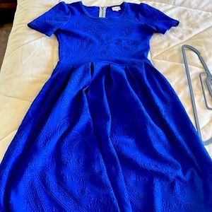 Flattering dress !  Could be used for maternity or regular! Has pockets !